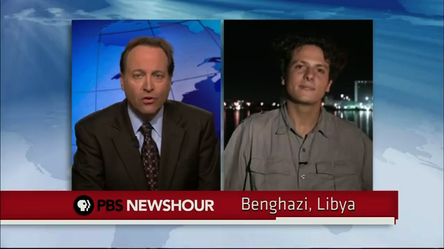 Live Hit: Libyans celebrate as Gaddafi flees