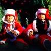 Two little boys celebrate Christmas in Bethlehem’s Manger Square.
