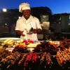 Street food, #Zanzibar style. Cooking grilled octopus at the Forodhani night market in Stone Town. #tanzania #streetfood #food #art #foodie #travel culture #africa