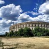 This is Kongresshalle at the Nazi Party Rally Grounds in Nuremberg, Germany. Construction on this massive congressional hall for Hitler's National Socialists started in 1935 but was halted before completion due to the outbreak of WWII. About twice the size of Rome's Coliseum, it is the largest surviving monument of Nazi architecture in Germany. And its continued renovation by the city has sparked controversy. #Germany #history #wwii #travel