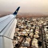 Landing in Muscat for a quick weekend in Oman. The Hajar Mountains, which you can kind of see in the background, are mostly covered in sandy haze. #Muscat #Oman #Arabia #weather #travel