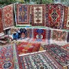 Selling carpets on the streets of #Yerevan. #Armenia #travel #cnnsilkroad #redcarpet #handmade #art